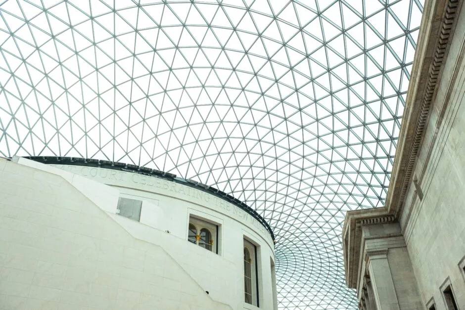 the ceiling of a building with a glass roof